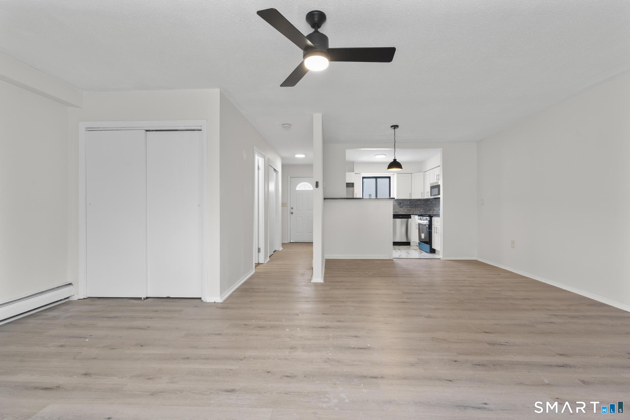 83 Sutton Place, Unit 83 Bloomfield, CT 06002 - Photo 9 of 29 a view of a kitchen with a sink and a cabinet