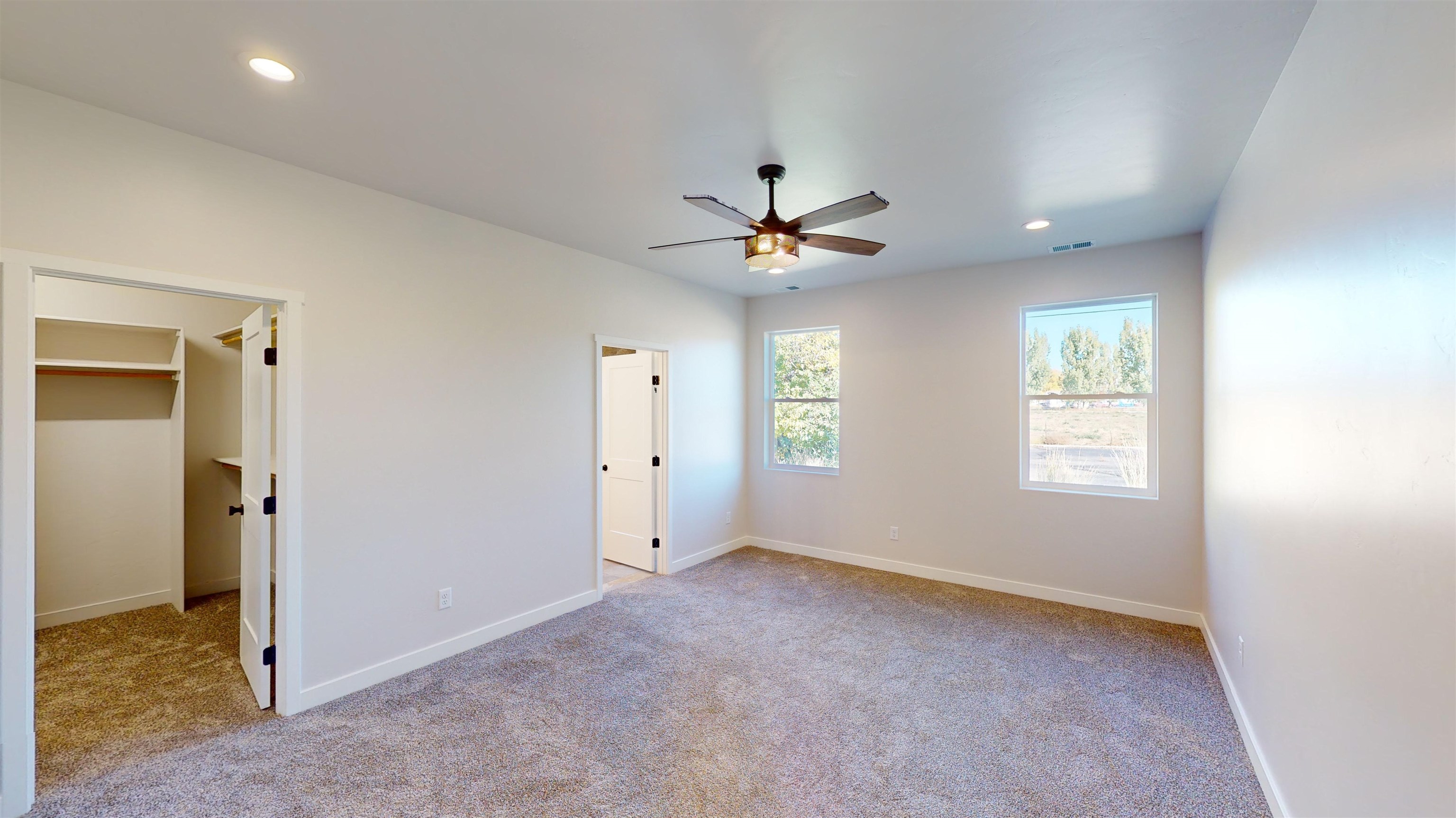2954 Apollo Drive Grand Junction, CO 81504 - Photo 22 of 40 a view of an empty room with a window