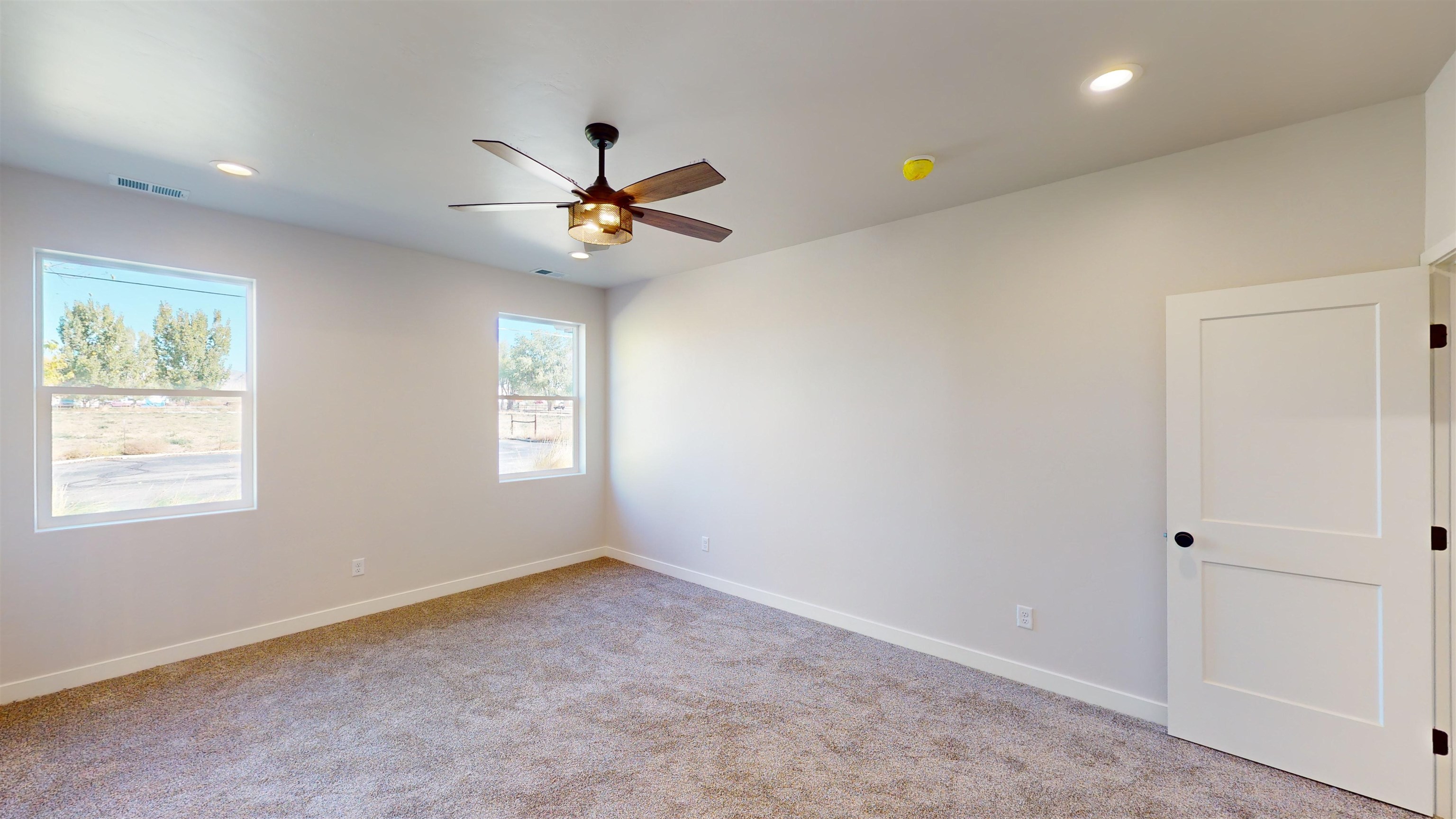 2954 Apollo Drive Grand Junction, CO 81504 - Photo 23 of 40 a view of an empty room with a window