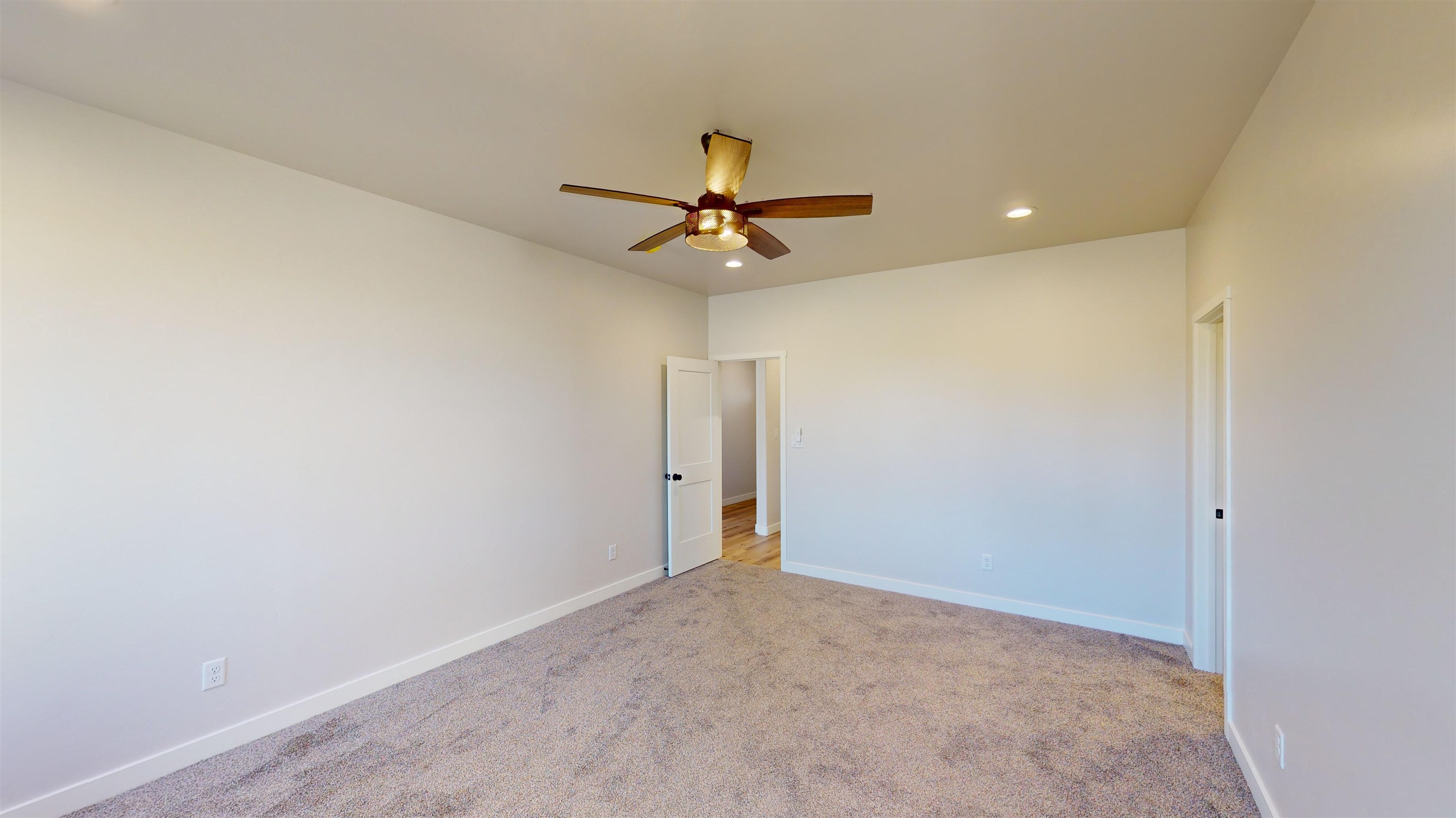 2954 Apollo Drive Grand Junction, CO 81504 - Photo 24 of 40 a view of a chandelier fan in a room