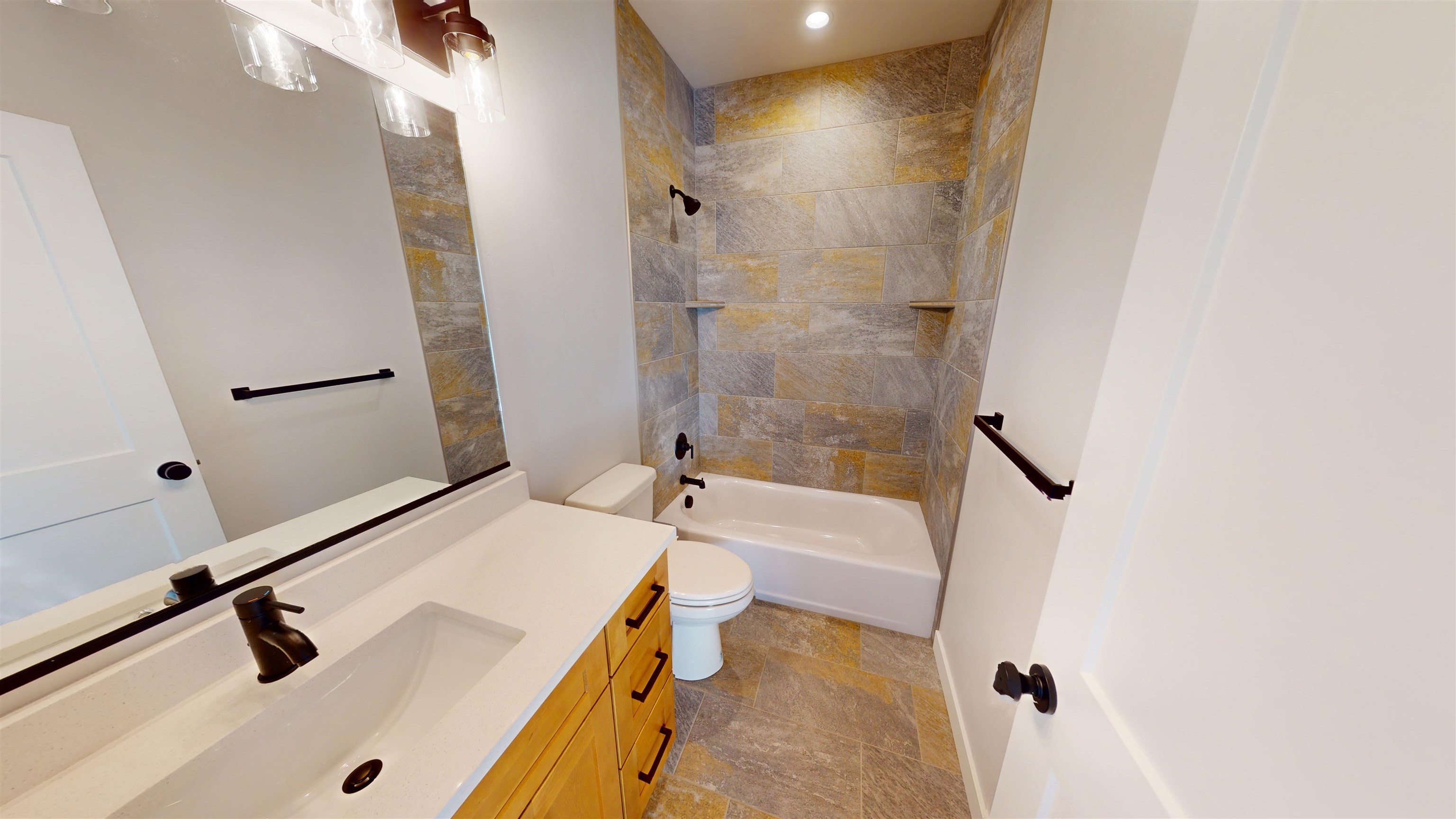 2954 Apollo Drive Grand Junction, CO 81504 - Photo 28 of 40 a bathroom with a sink and a mirror