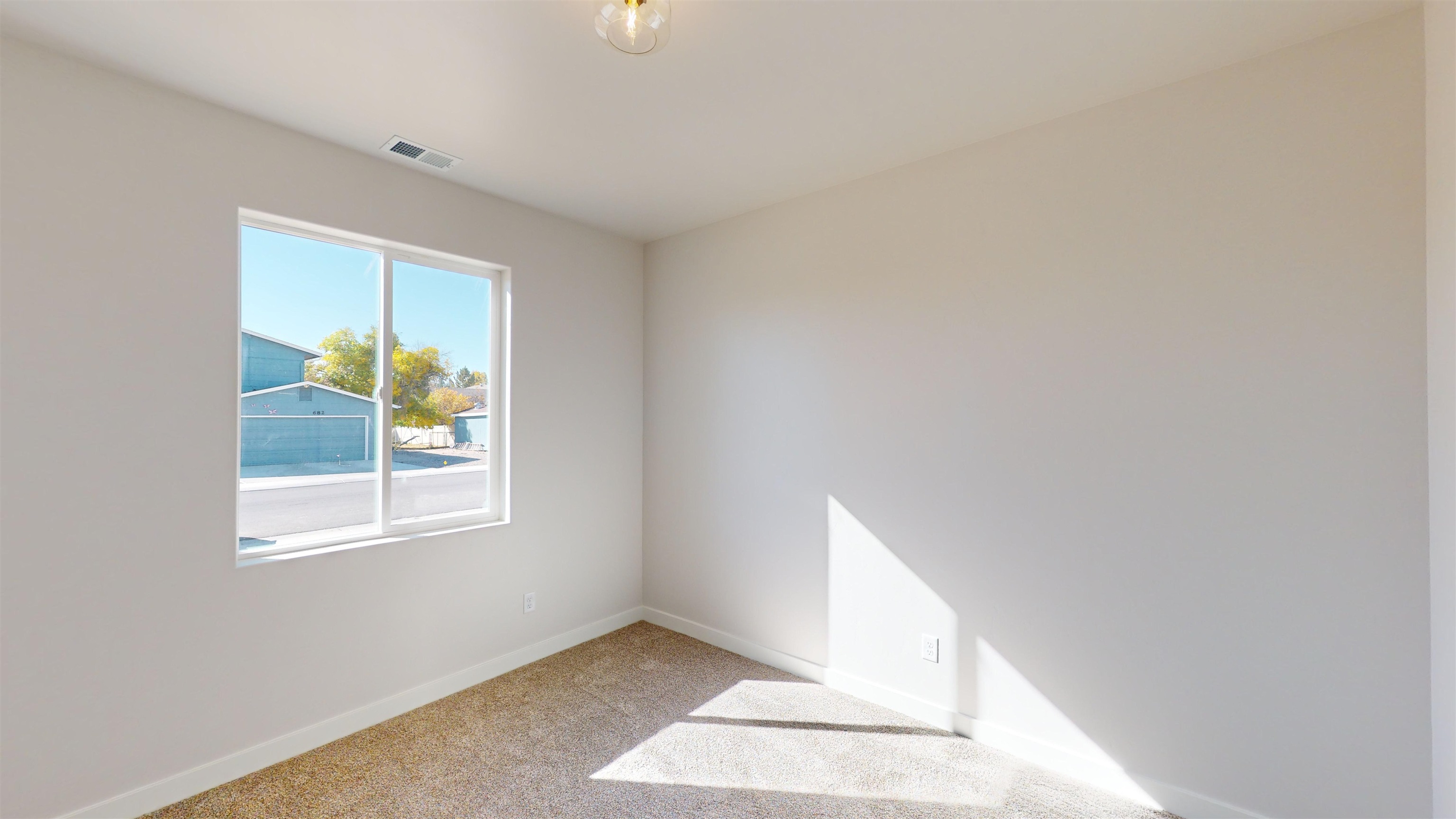 2954 Apollo Drive Grand Junction, CO 81504 - Photo 30 of 40 a view of an empty room and window