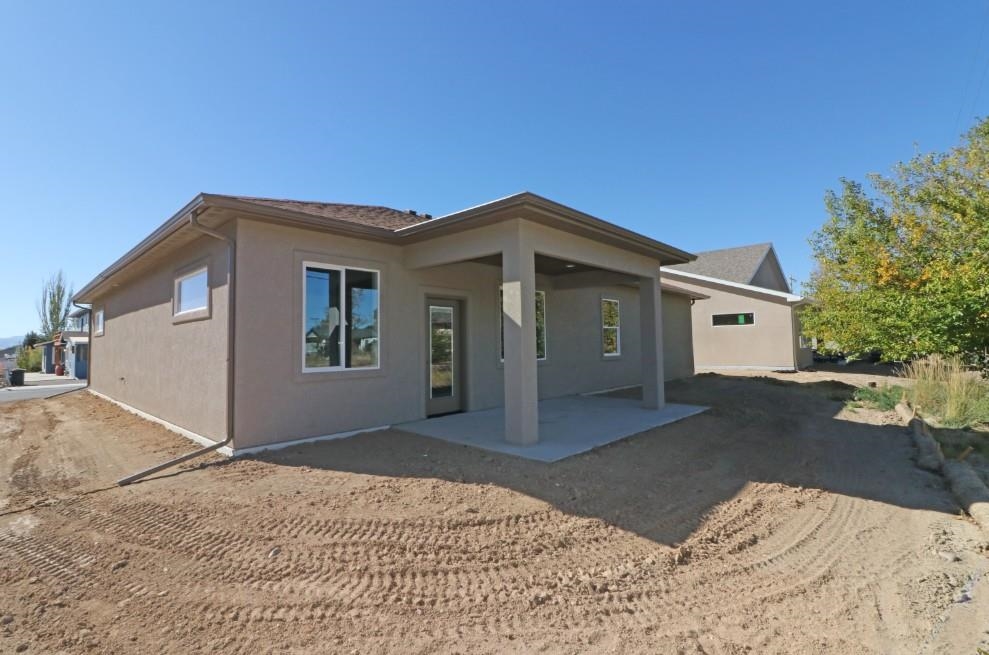 2954 Apollo Drive Grand Junction, CO 81504 - Photo 35 of 40 a front view of a house with a garage