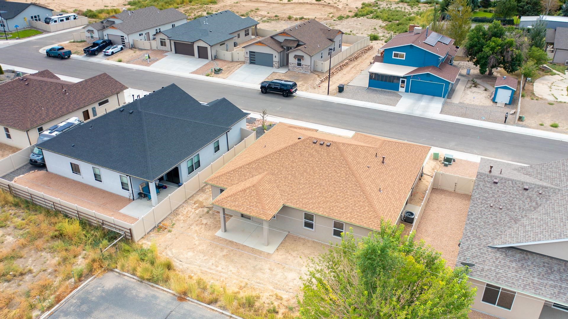 2954 Apollo Drive Grand Junction, CO 81504 - Photo 5 of 40 an aerial view of multiple houses with yard