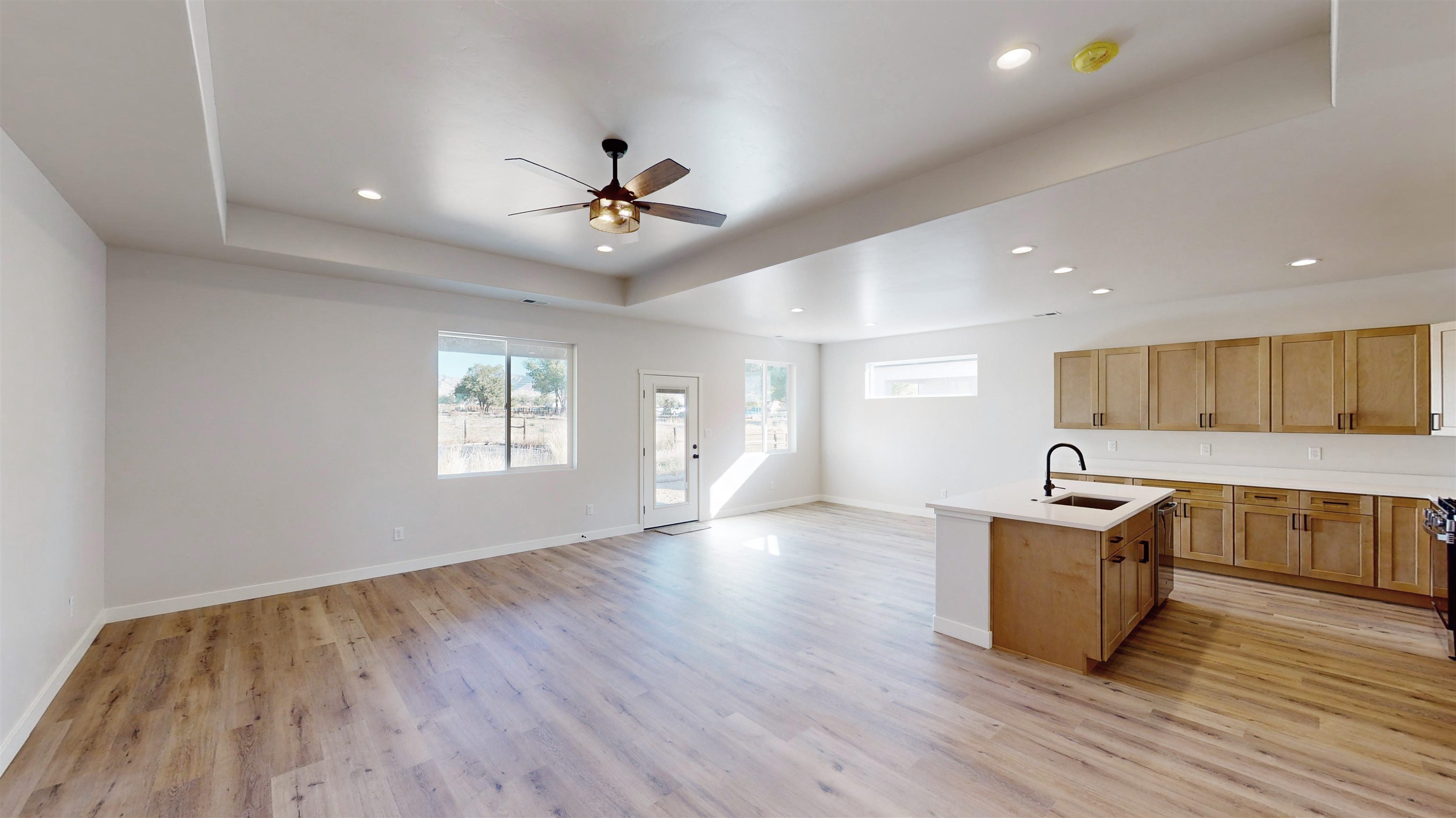 2954 Apollo Drive Grand Junction, CO 81504 - Photo 7 of 40 a view of kitchen with sink microwave and stove