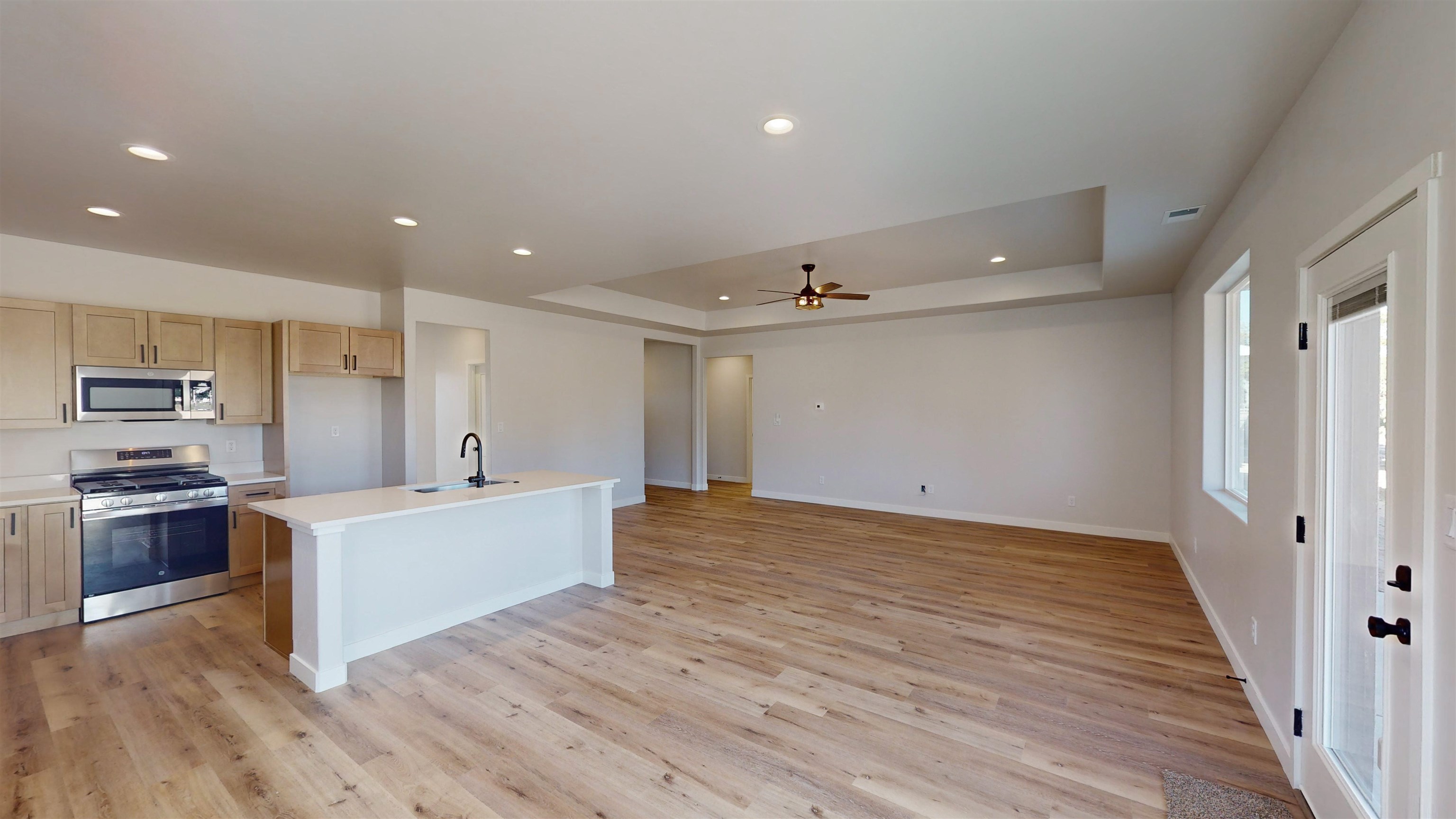 2954 Apollo Drive Grand Junction, CO 81504 - Photo 9 of 40 a view of kitchen with wooden floor and electronic appliances
