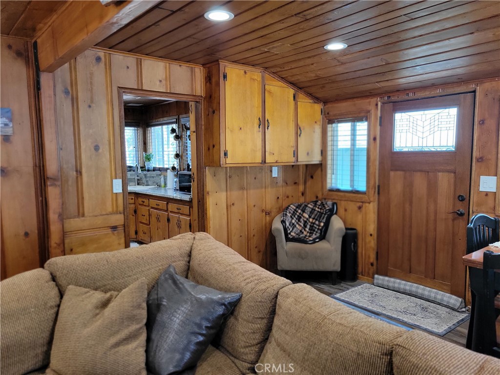 1116 Lark Road Wrightwood, CA 92397 - Photo 18 of 46 a balcony with furniture and window