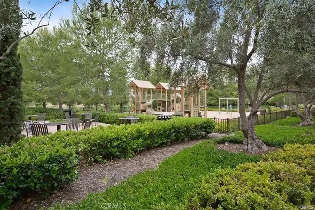 a view of a house with backyard and porch