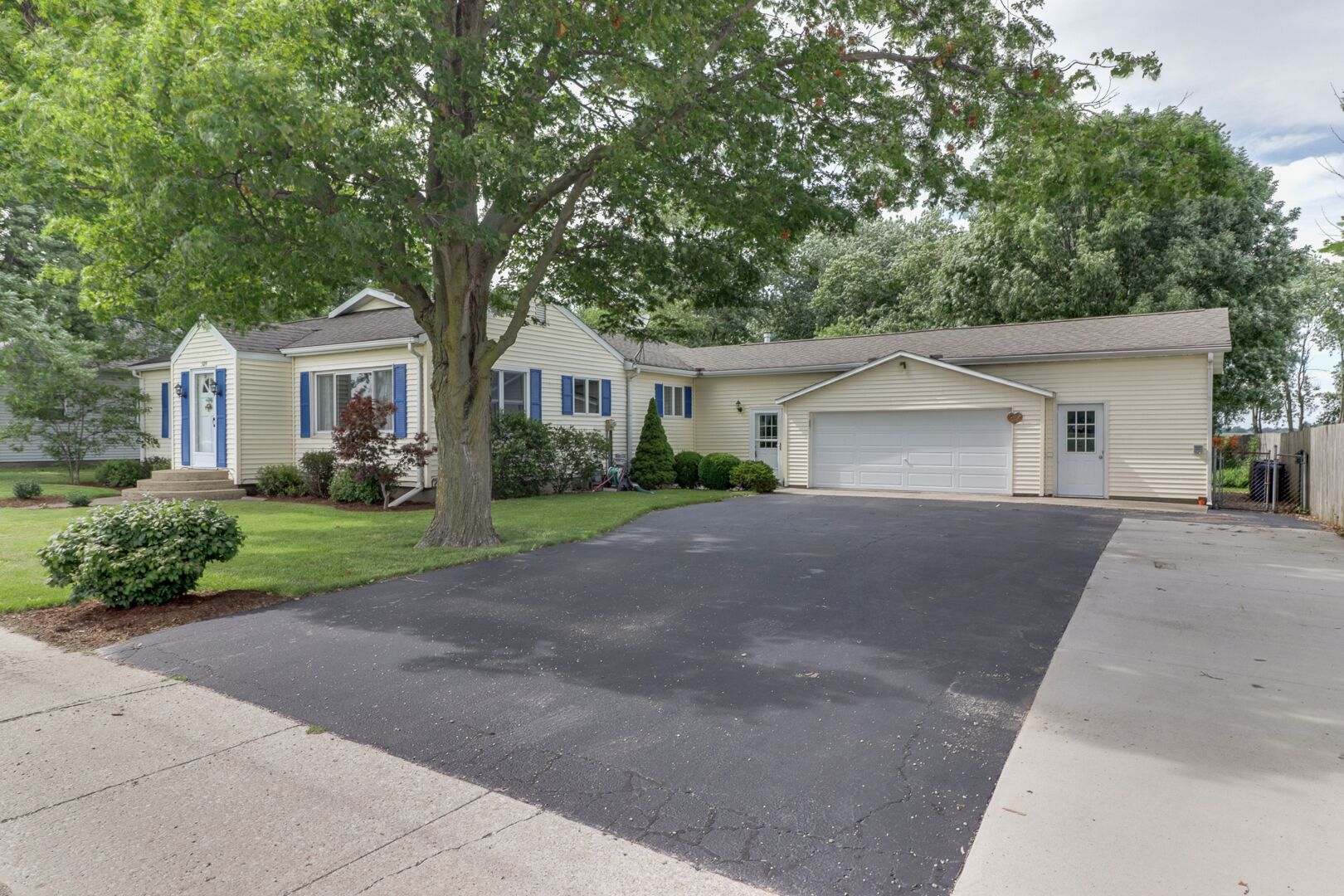 front view of a house and a yard