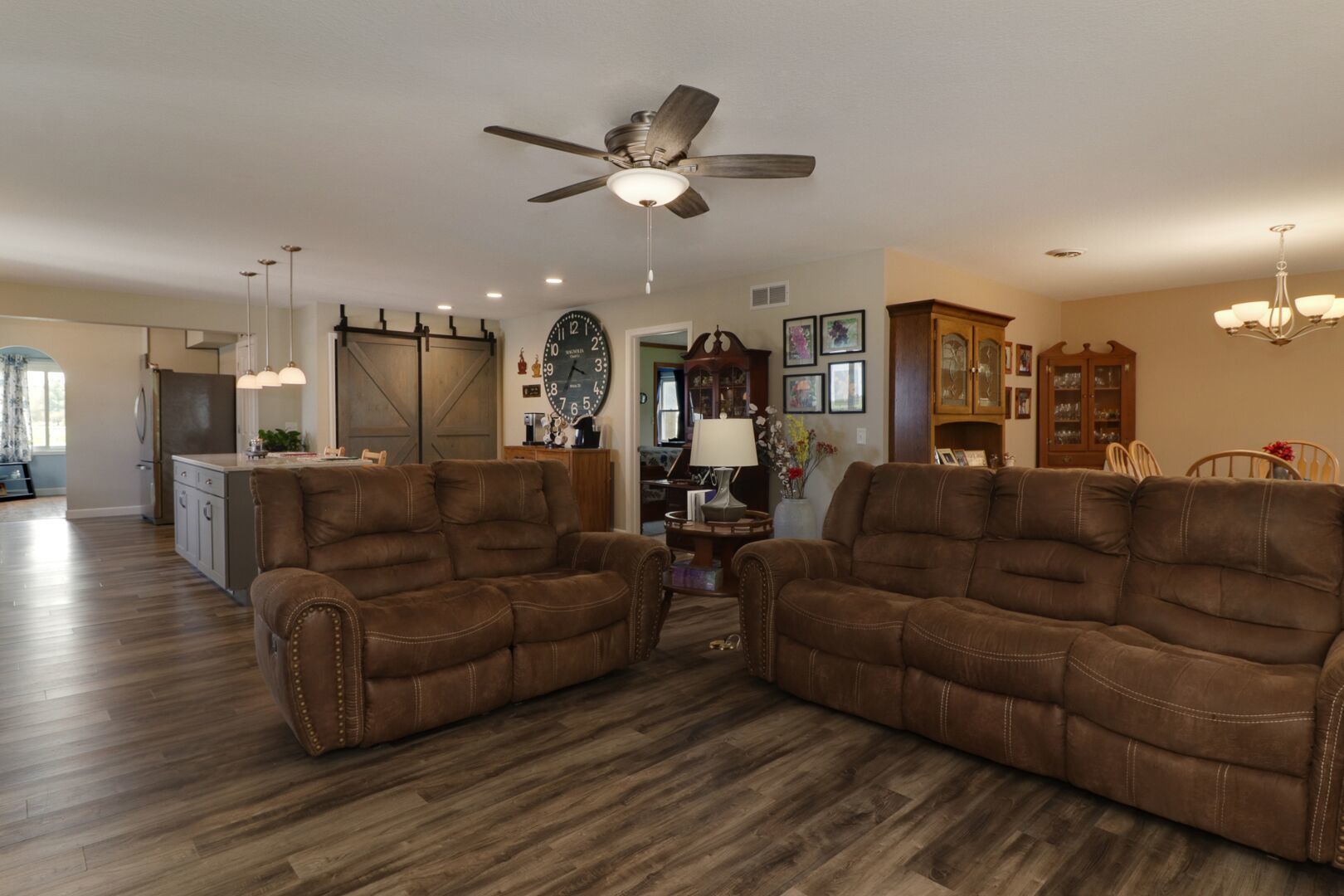 509 Division Road Wapella, IL 61777 - Photo 14 of 27 a living room with furniture and kitchen view