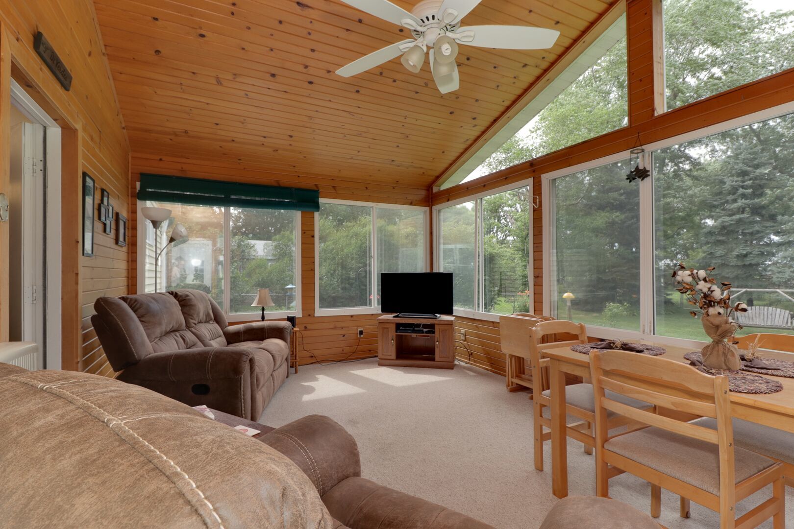 509 Division Road Wapella, IL 61777 - Photo 3 of 27 a living room with furniture tv and large windows