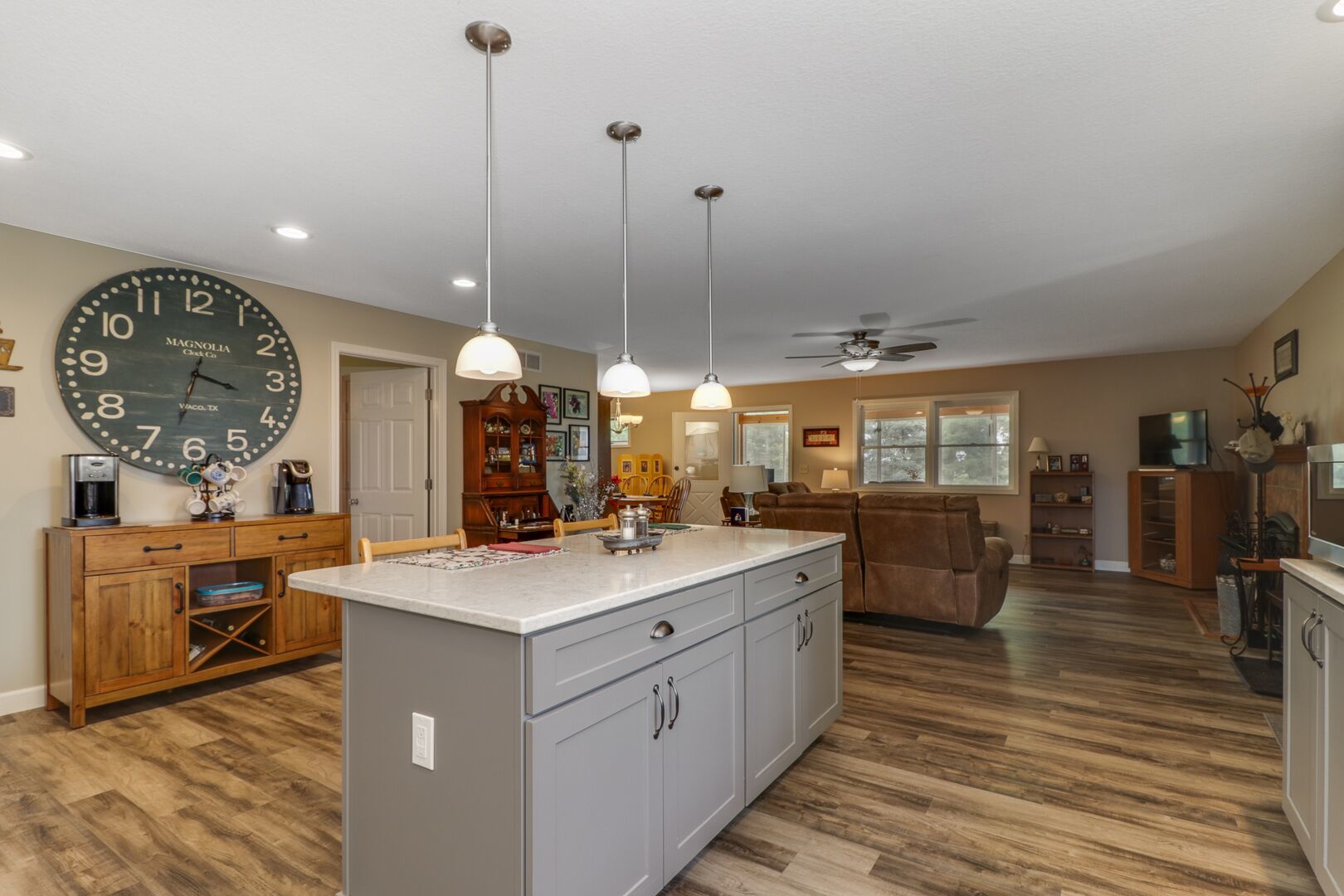 509 Division Road Wapella, IL 61777 - Photo 9 of 27 a large kitchen with lots of counter space and a view of living room