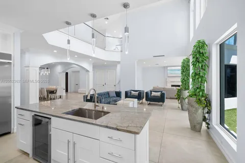 a spacious bedroom with a bed and a couch