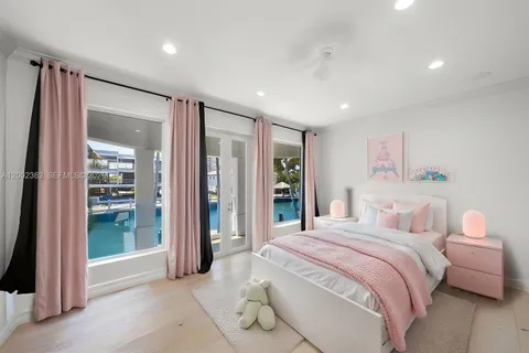 a view of a backyard with plants and a patio