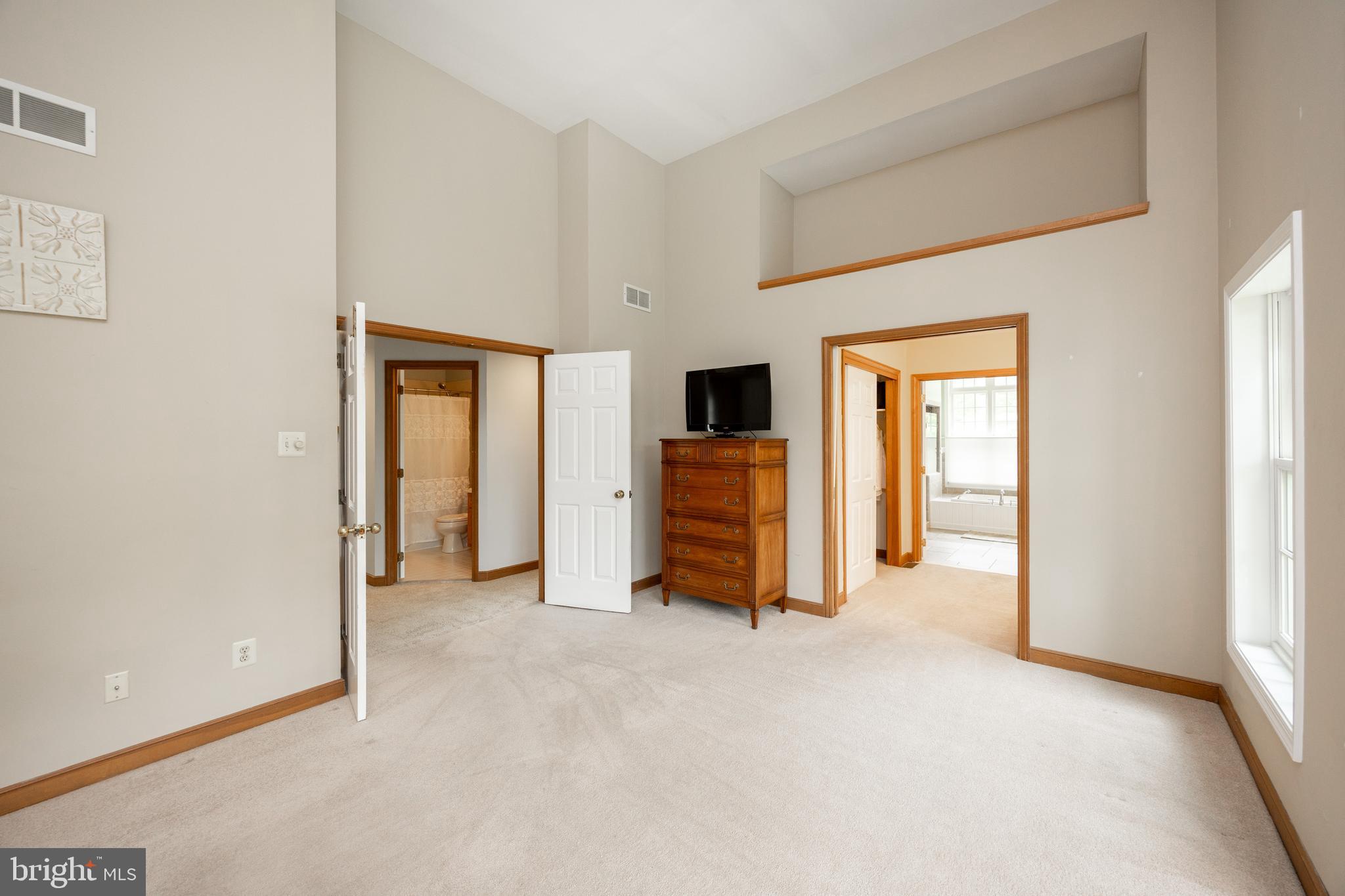 10 Brampton Road Malvern, PA 19355 - Photo 26 of 49 an empty room with furniture and a window