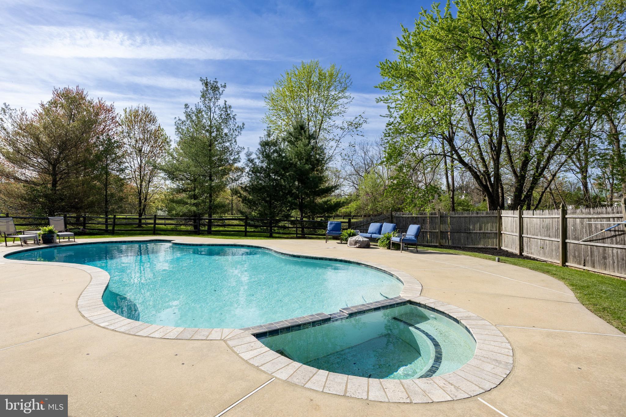10 Brampton Road Malvern, PA 19355 - Photo 3 of 49 a view of a swimming pool with a yard