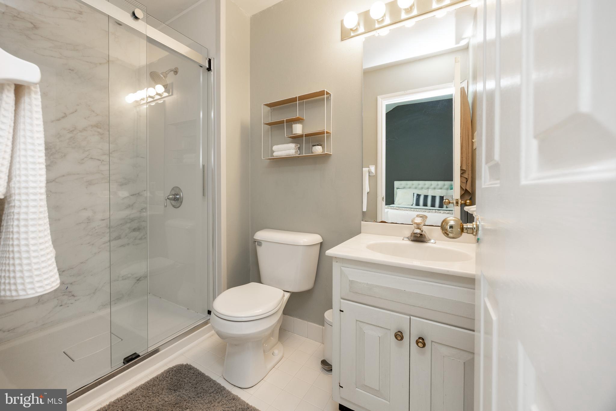 10 Brampton Road Malvern, PA 19355 - Photo 32 of 49 a bathroom with a sink toilet and shower