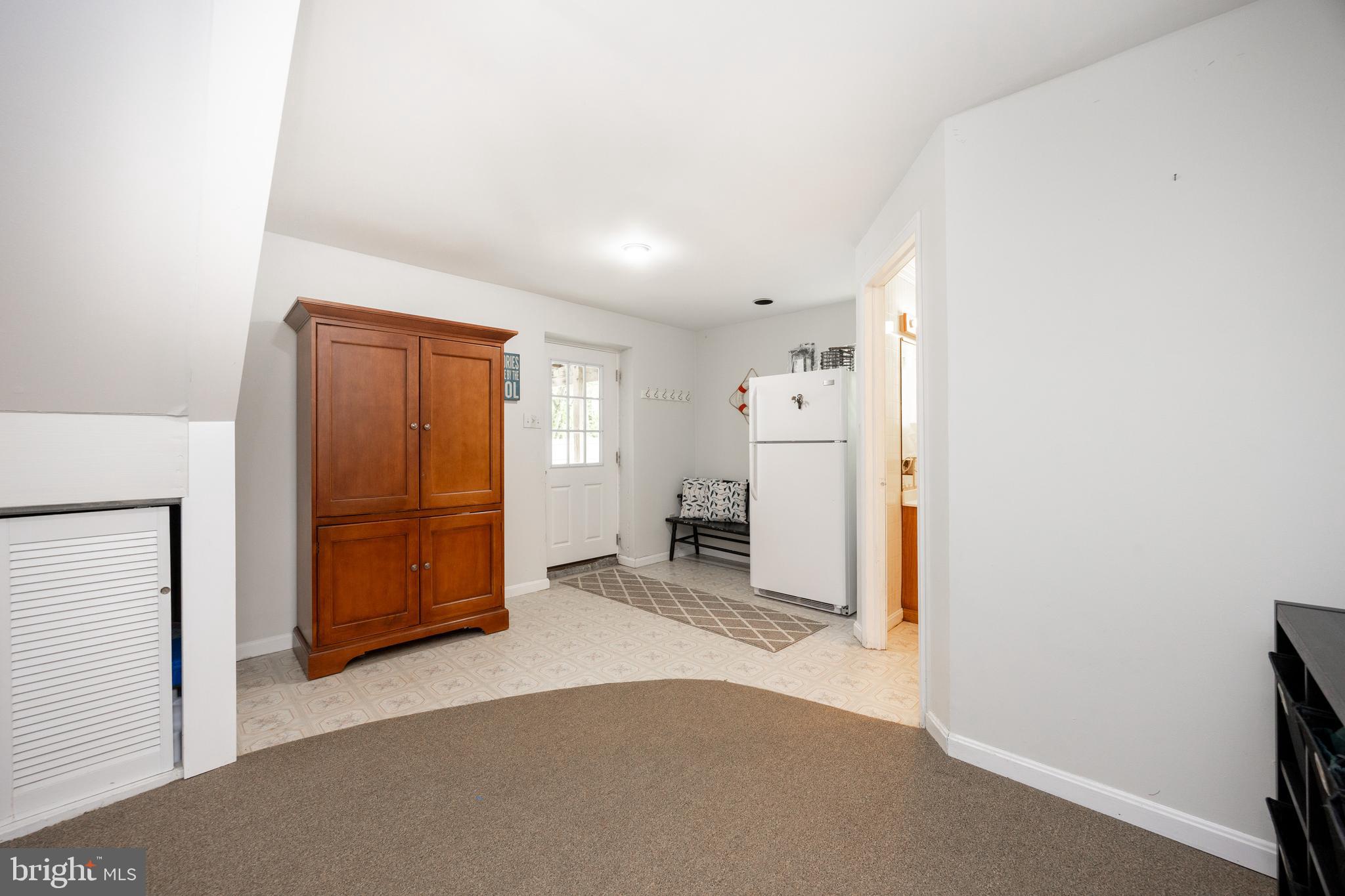 10 Brampton Road Malvern, PA 19355 - Photo 40 of 49 a view of a livingroom with a storage & utility room