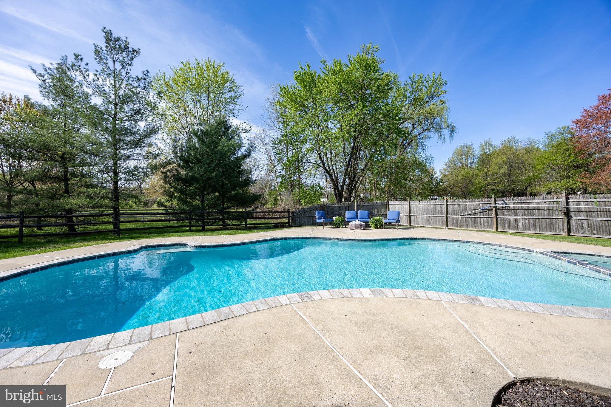 10 Brampton Road Malvern, PA 19355 - Photo 4 of 49 a view of a swimming pool with a yard