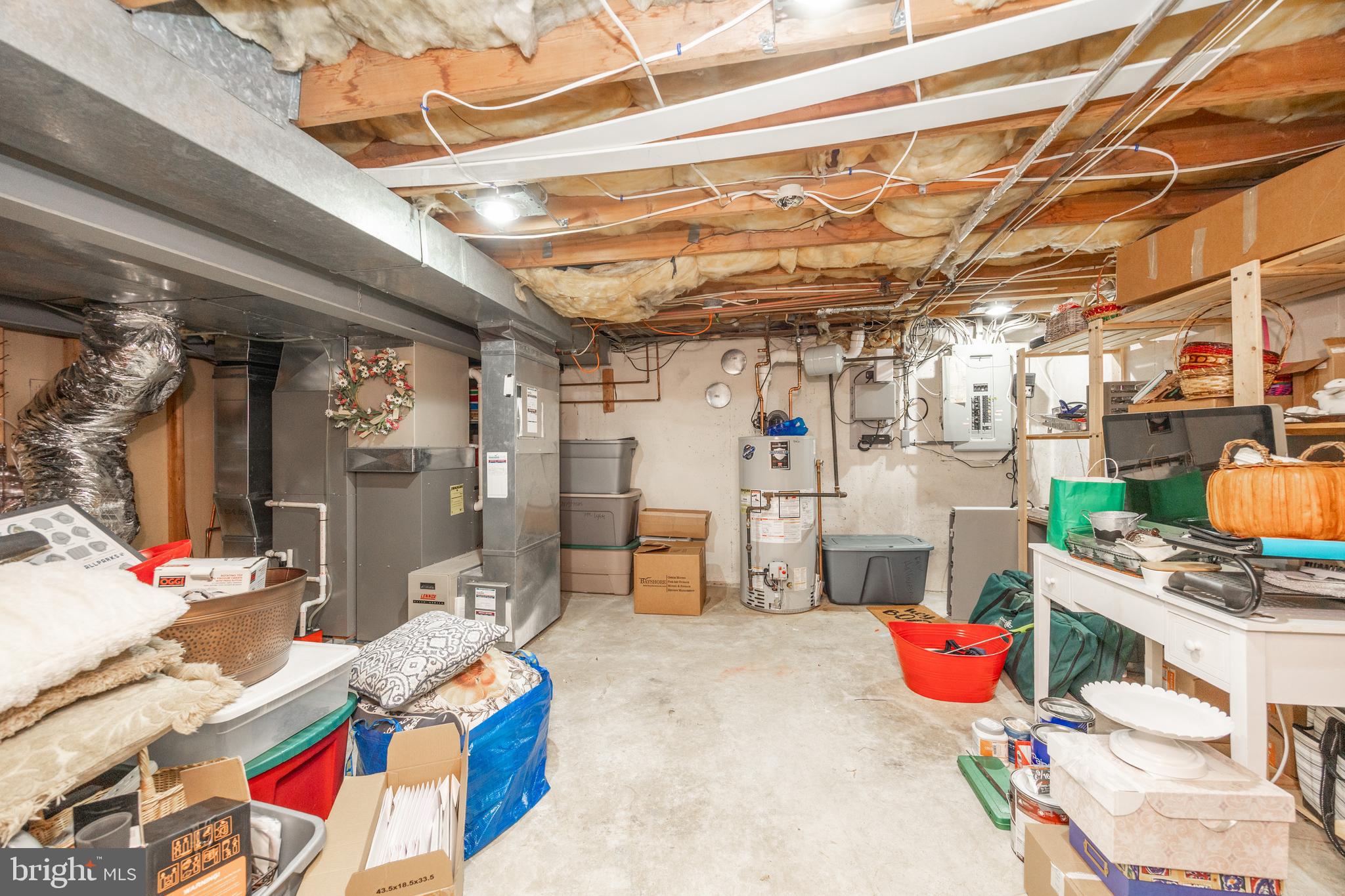 10 Brampton Road Malvern, PA 19355 - Photo 41 of 49 a utility room with stainless steel appliances kitchen island granite countertop lots of clutter and cars