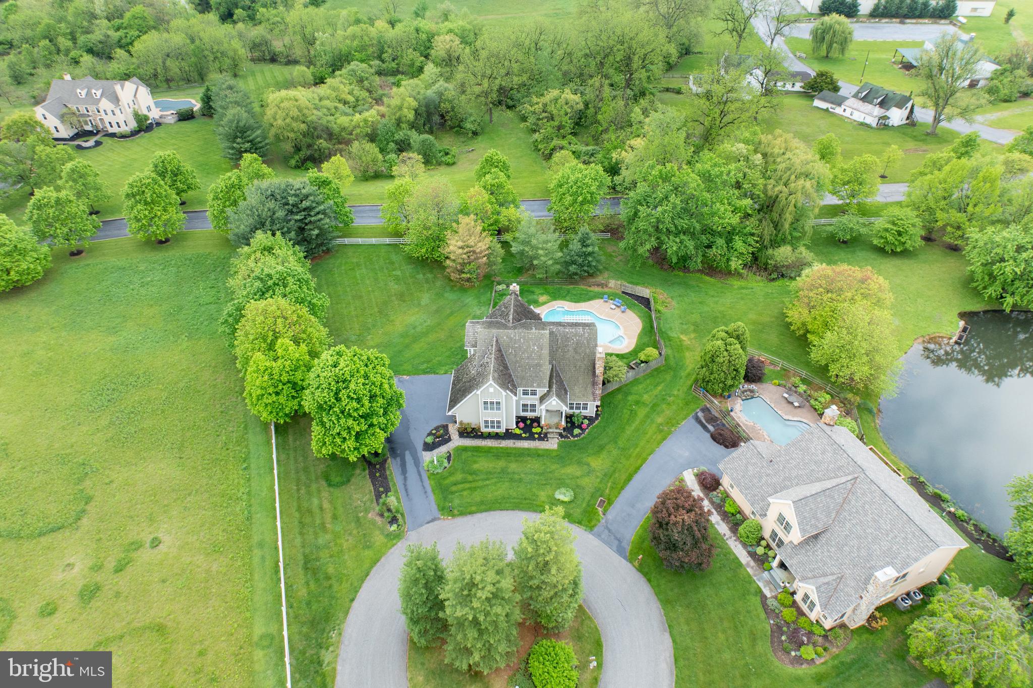 10 Brampton Road Malvern, PA 19355 - Photo 42 of 49 an aerial view of a house with yard swimming pool and outdoor seating
