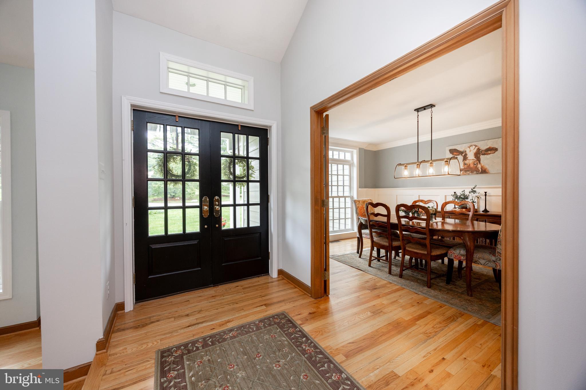 10 Brampton Road Malvern, PA 19355 - Photo 8 of 49 a living room with furniture and a table