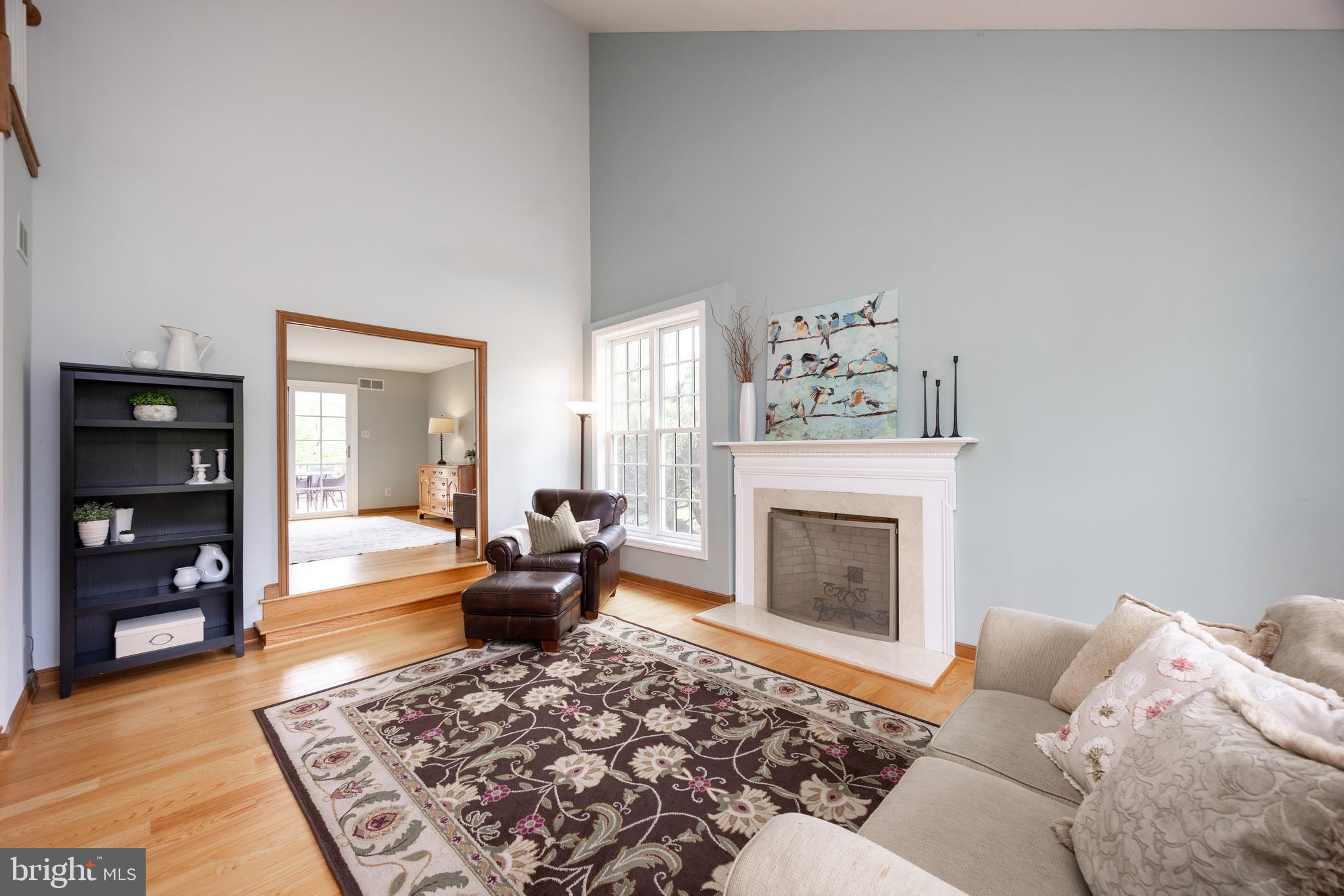 10 Brampton Road Malvern, PA 19355 - Photo 10 of 49 a living room with furniture and a fireplace