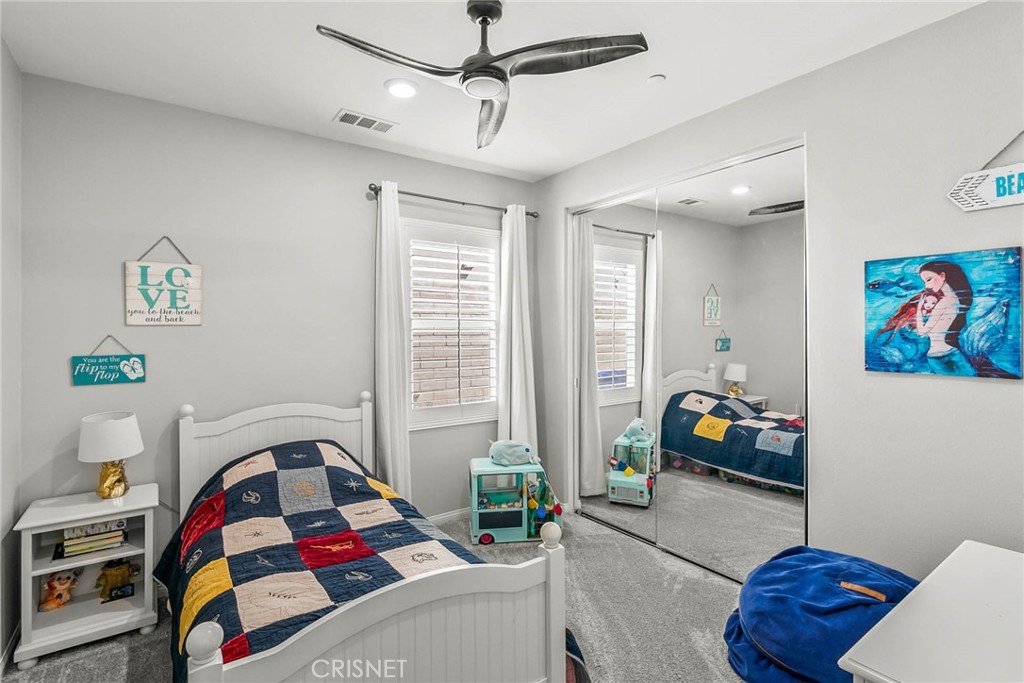 19663 Griffith Drive Saugus, CA 91350 - Photo 12 of 28 a bedroom with furniture and a window