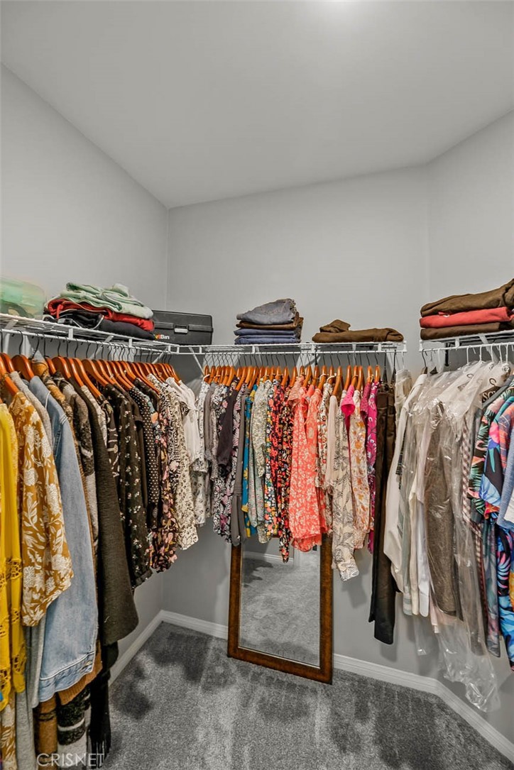 19663 Griffith Drive Saugus, CA 91350 - Photo 16 of 28 a view of walk in closet with clothes