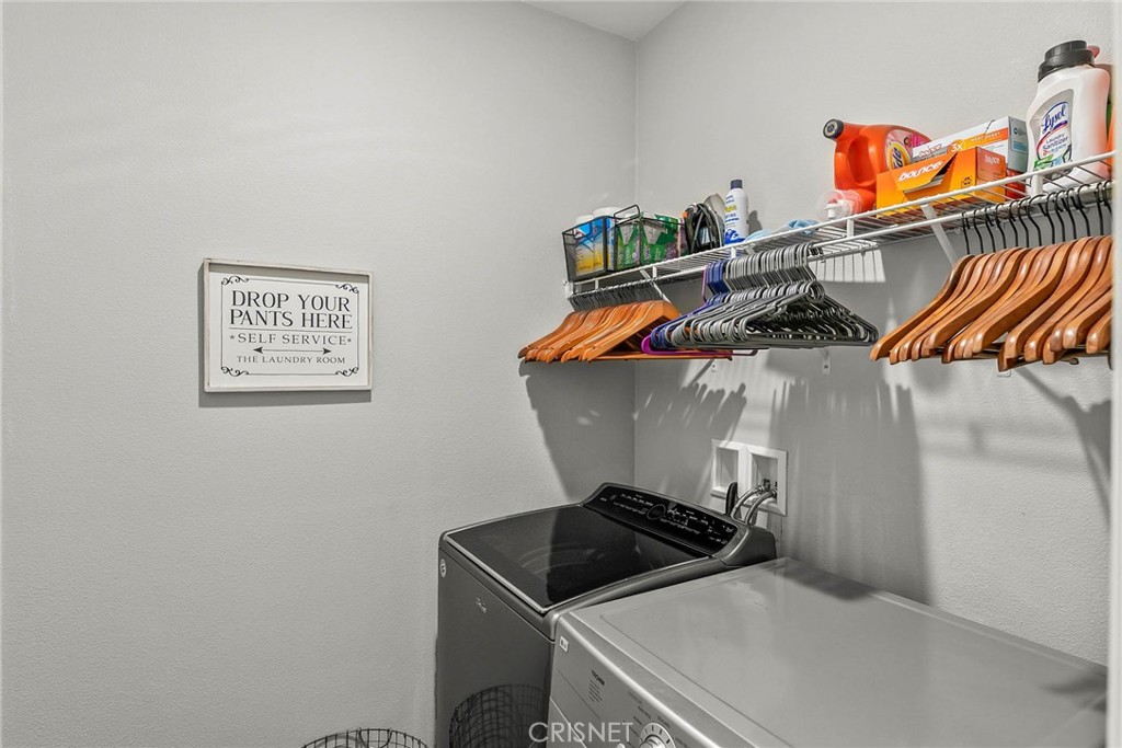 19663 Griffith Drive Saugus, CA 91350 - Photo 19 of 28 a utility room with dryer and washer