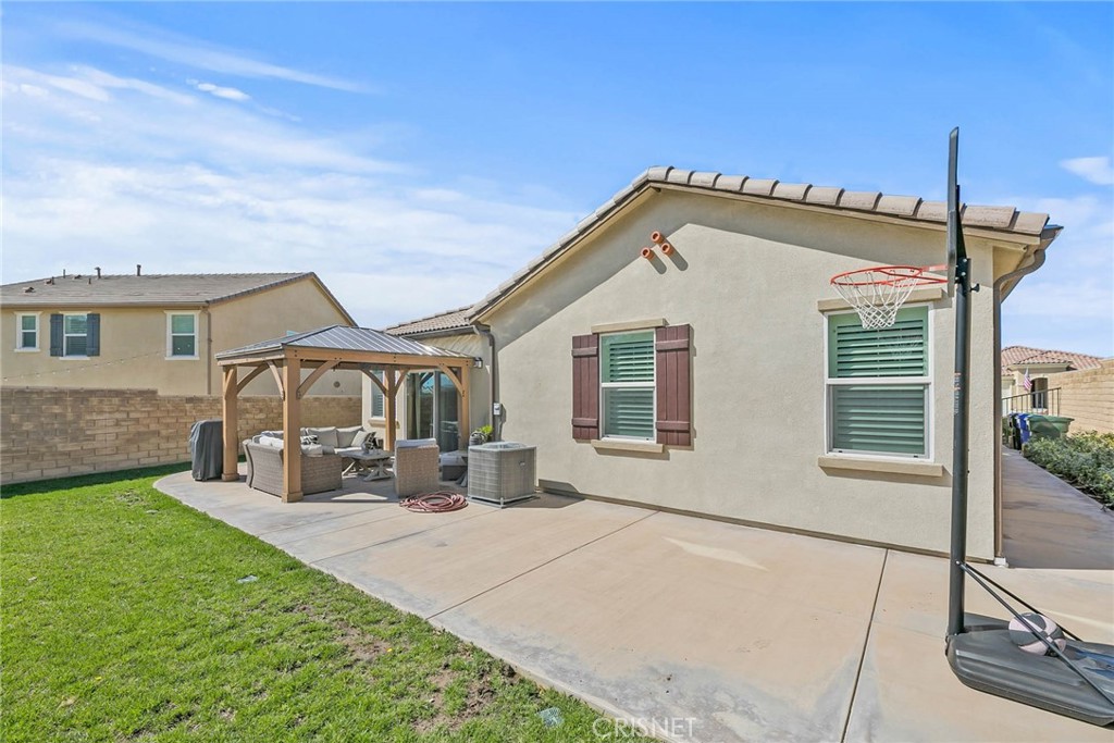 19663 Griffith Drive Saugus, CA 91350 - Photo 26 of 28 a front view of a house with yard