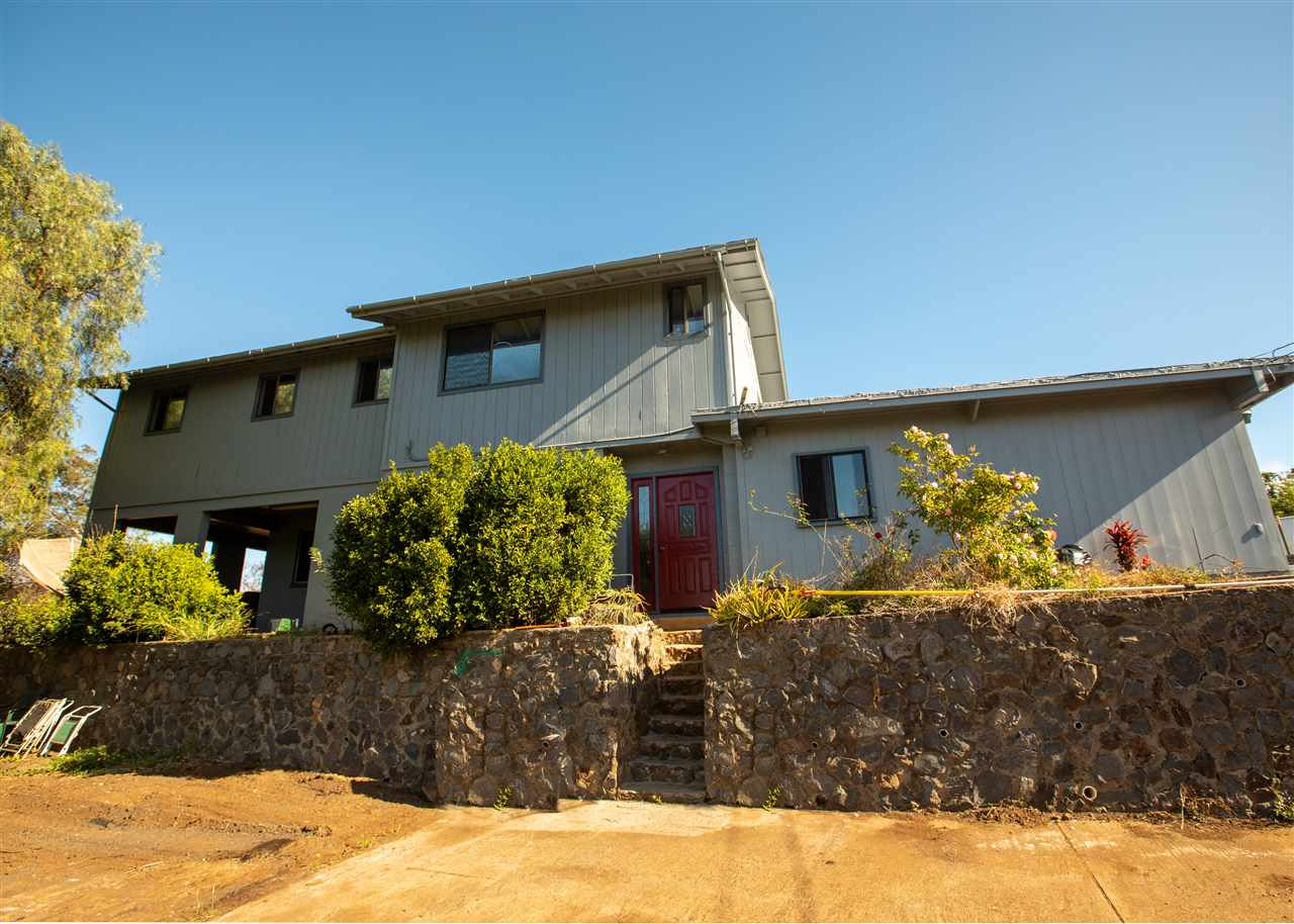 586 Naalae Road Kula, HI 96790 - Photo 1 of 30 a front view of a house with natural light