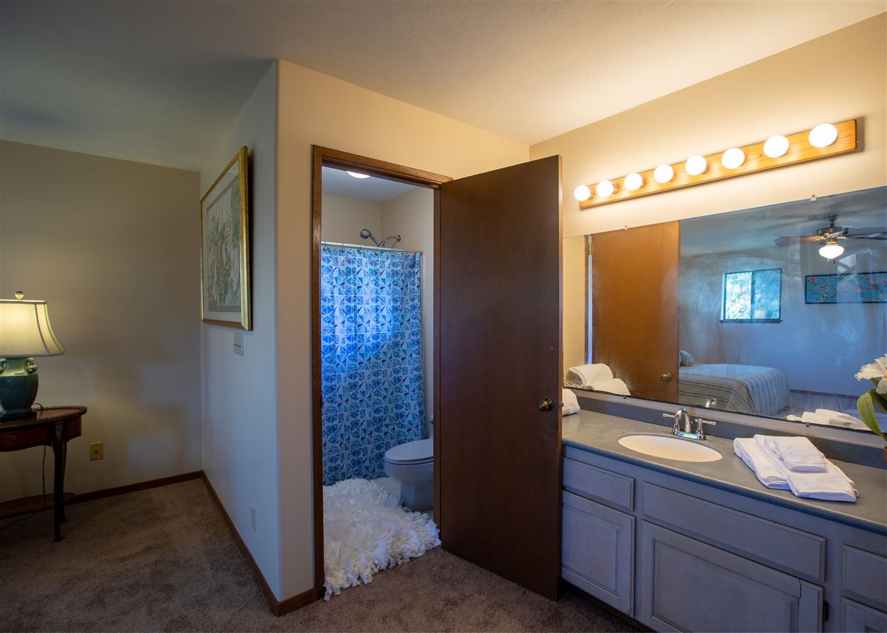 586 Naalae Road Kula, HI 96790 - Photo 23 of 30 a bathroom with a sink and a mirror