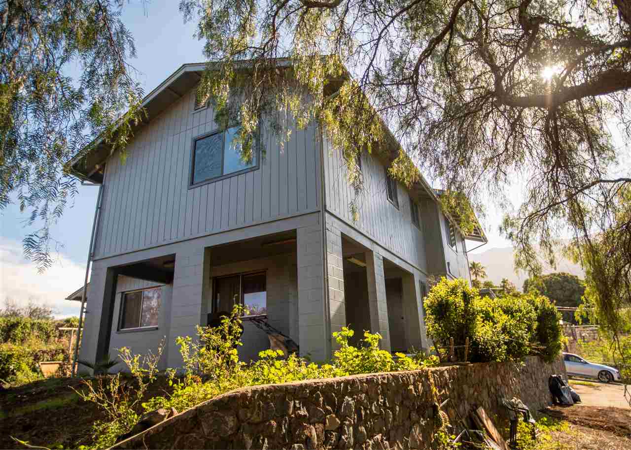 586 Naalae Road Kula, HI 96790 - Photo 5 of 30 a front view of house along with trees