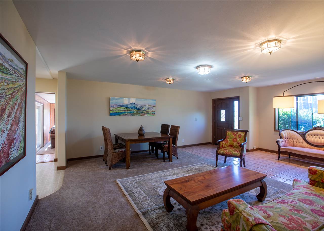 586 Naalae Road Kula, HI 96790 - Photo 8 of 30 a view of a livingroom with furniture window and wooden floor