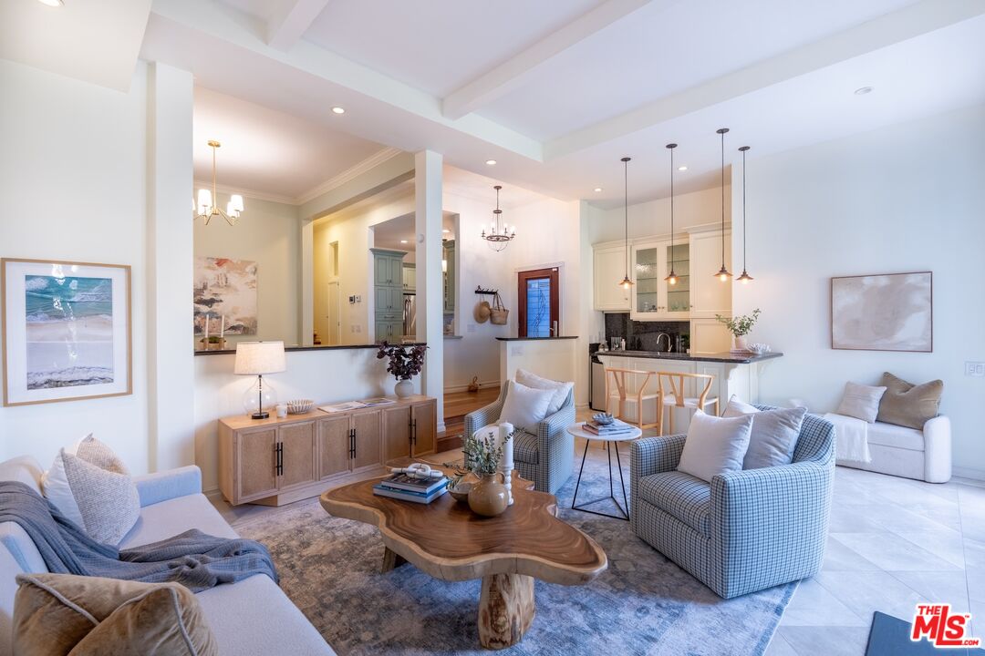 20 Ketch Street, Unit 1 Marina del Rey, CA 90292 - Photo 3 of 39 a living room with furniture and a view of kitchen