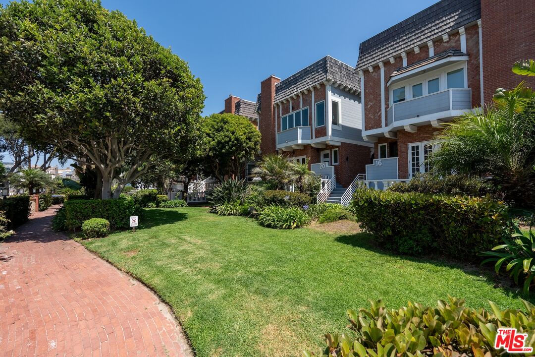 20 Ketch Street, Unit 1 Marina del Rey, CA 90292 - Photo 6 of 39 a view of a building with a yard