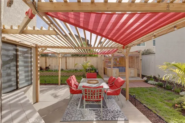 a outdoor space with patio lots of furniture and garden view