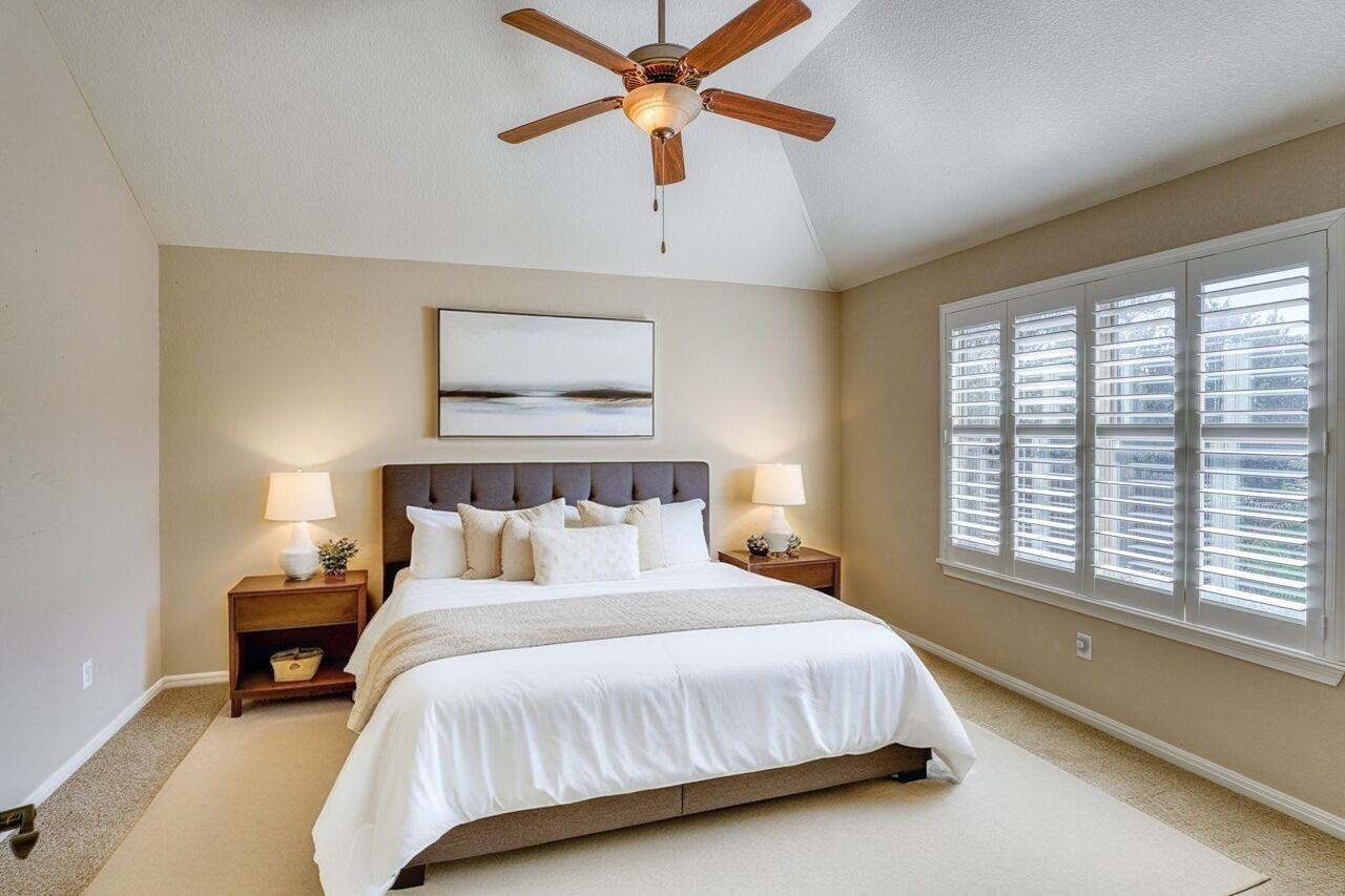 1403 Adam Burnet, TX 78611 - Photo 16 of 30 a bedroom with a bed and a window