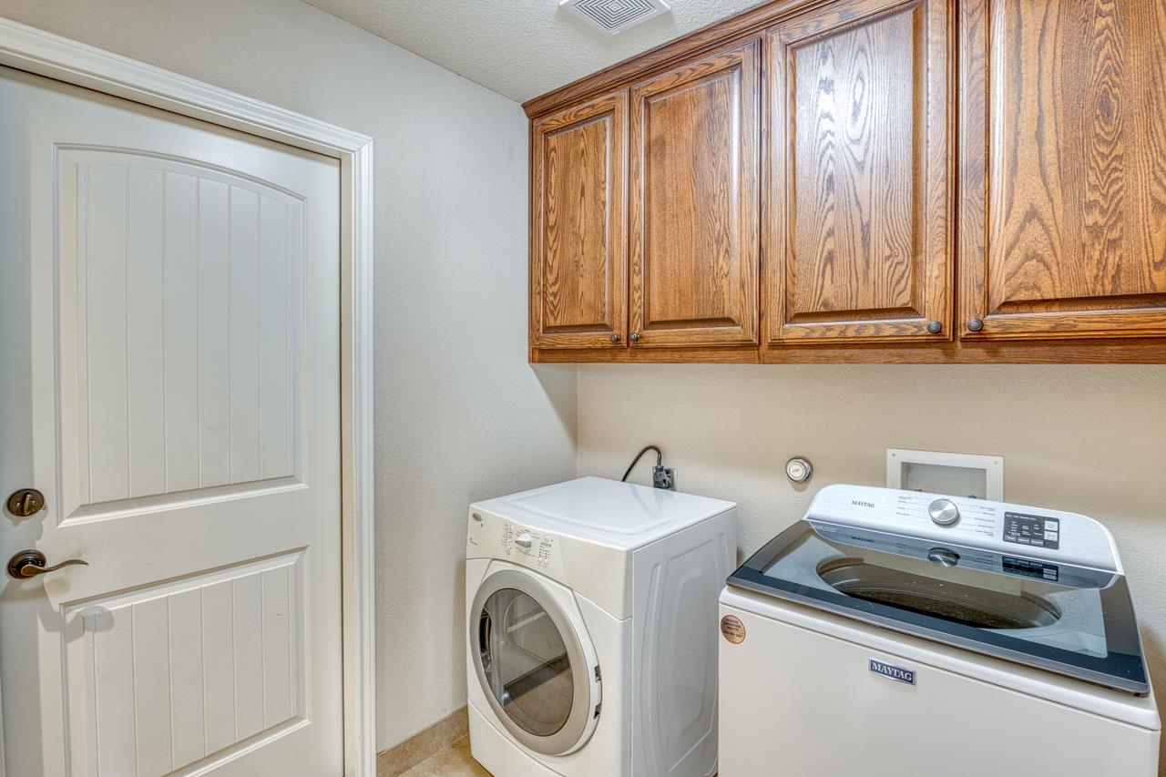 1403 Adam Burnet, TX 78611 - Photo 19 of 30 a utility room with dryer and washer