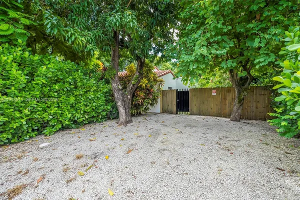 a view of a house with a tree and a tree