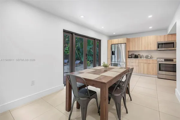 a view of a dining room with furniture