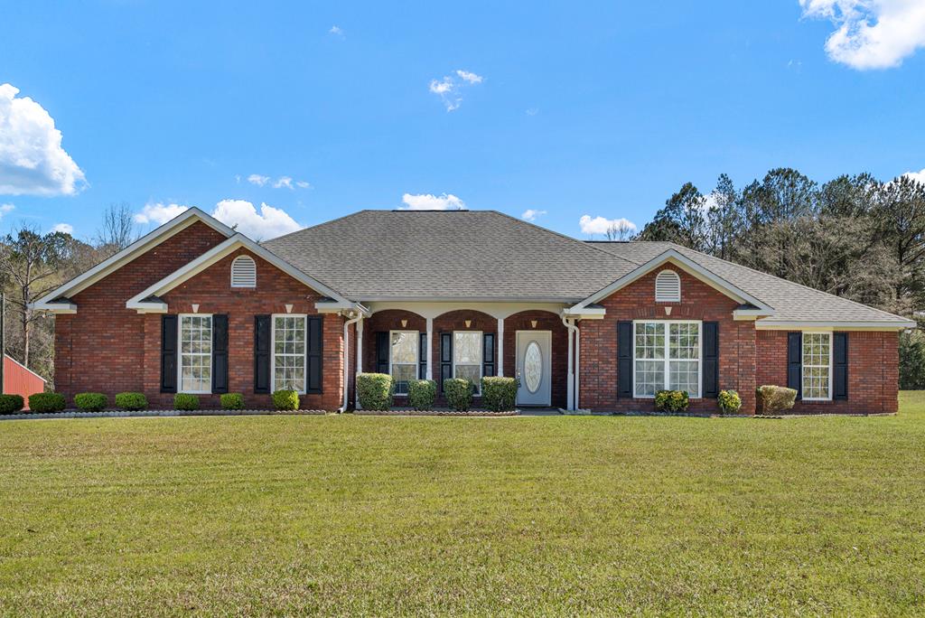 2034 Lee Road Salem, AL 36874 - Photo 1 of 47 a front view of a house with a yard