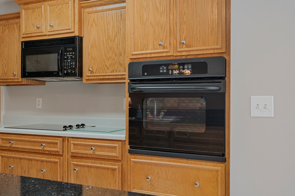 2034 Lee Road Salem, AL 36874 - Photo 15 of 47 a stove top oven sitting inside of a kitchen