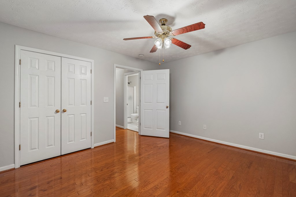2034 Lee Road Salem, AL 36874 - Photo 27 of 47 a view of an empty room with wooden floor