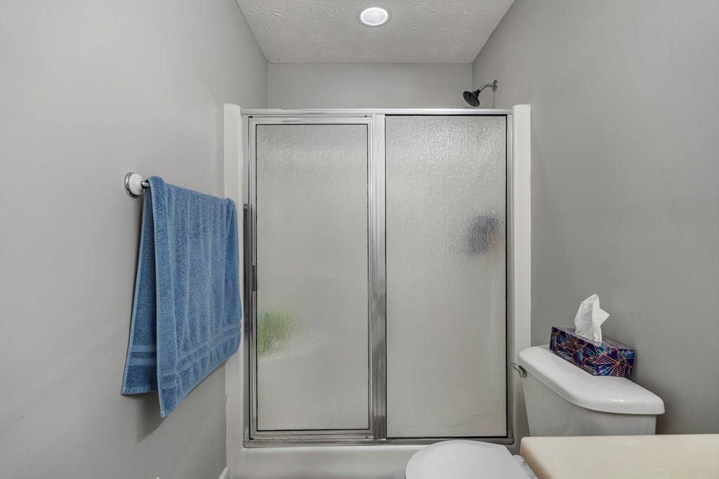 2034 Lee Road Salem, AL 36874 - Photo 29 of 47 a bathroom with a tub and shower