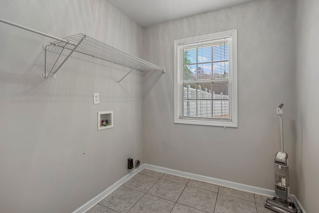 2034 Lee Road Salem, AL 36874 - Photo 30 of 47 a view of a room with rack on the wall and a window