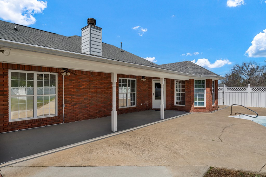 2034 Lee Road Salem, AL 36874 - Photo 32 of 47 a front view of a house with a garden and entryway