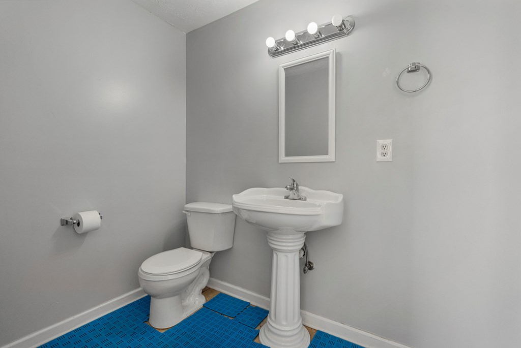 2034 Lee Road Salem, AL 36874 - Photo 33 of 47 a bathroom with a sink and mirror