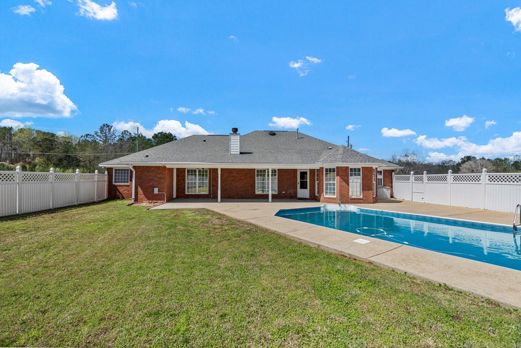 2034 Lee Road Salem, AL 36874 - Photo 34 of 47 a front view of a house with garden